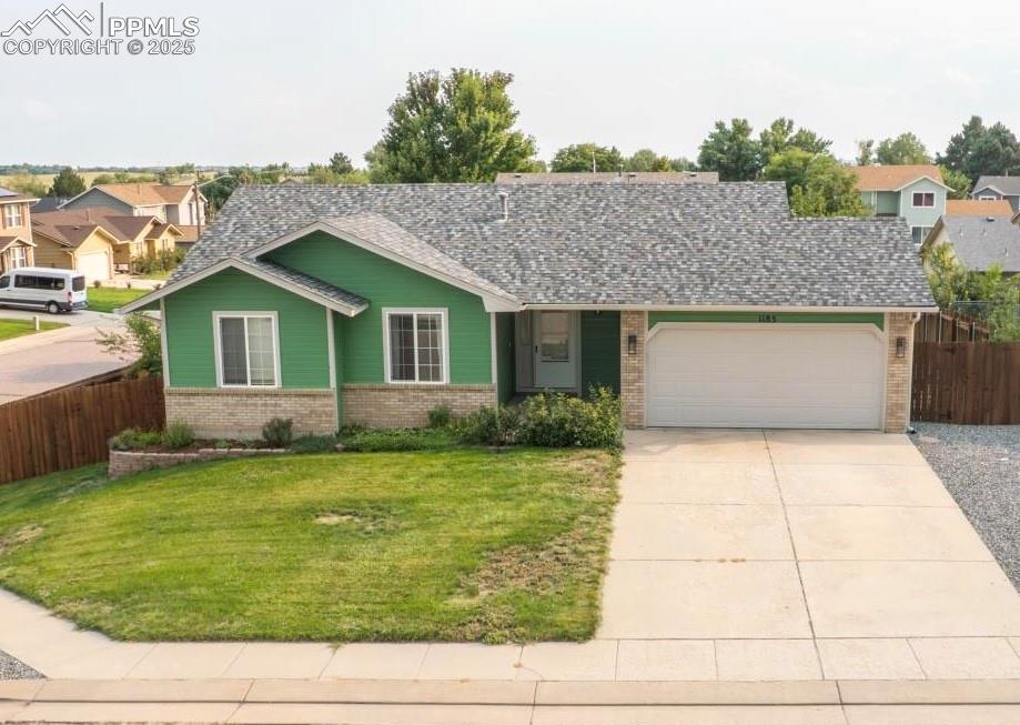 Caption: Enjoy the fresh look of a newly painted exterior and new carpet throughout interior.