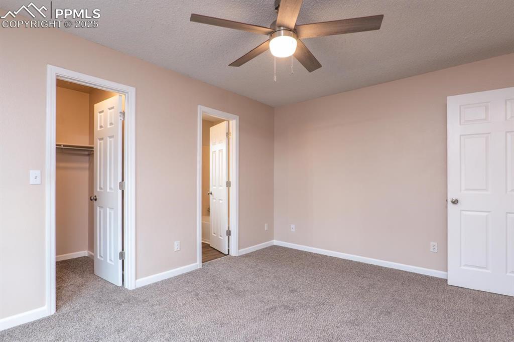 Image 11 of 26: New Carpet and Ceiling Fan.
