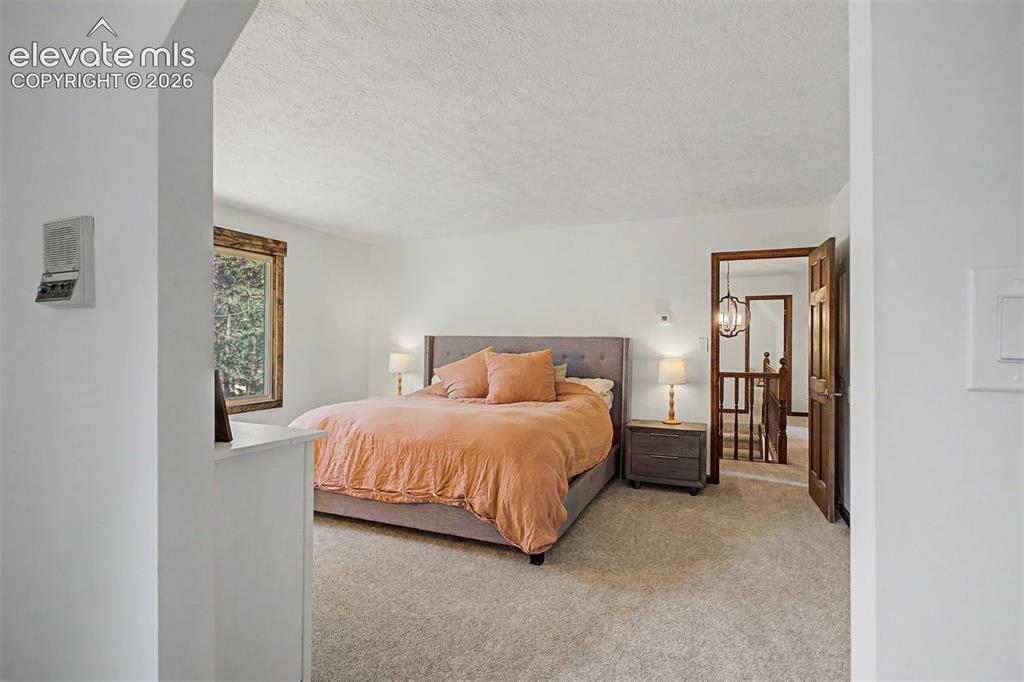 Image 16 of 49: Bedroom