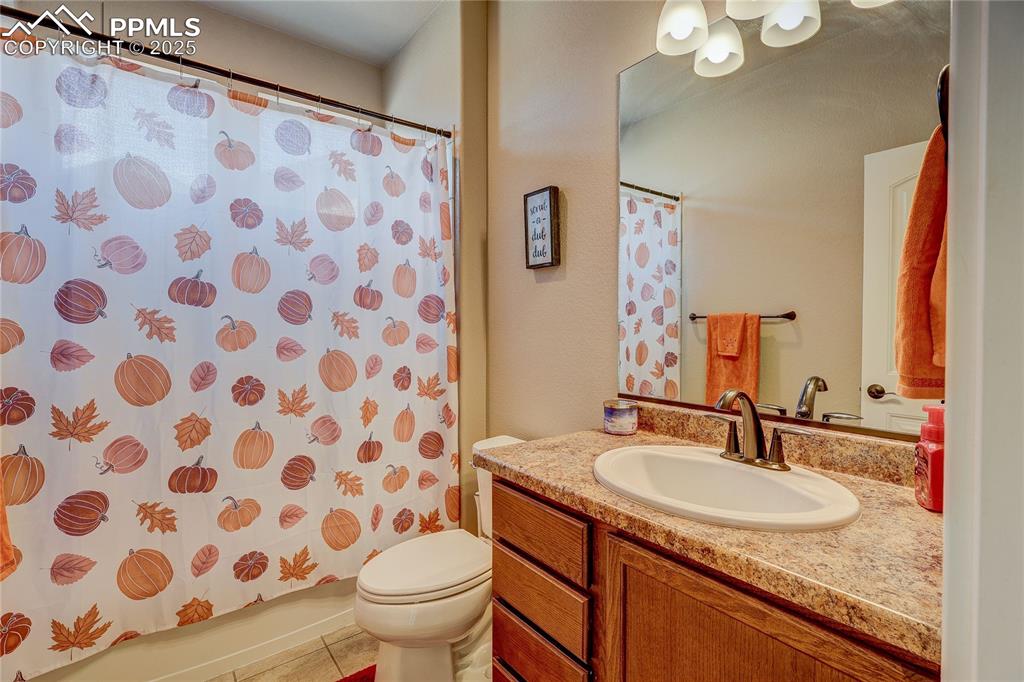 Image 27 of 49: 2nd full bath on main floor