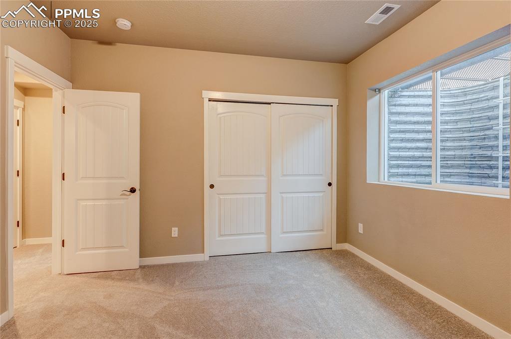 Image 40 of 49: 4th bedroom