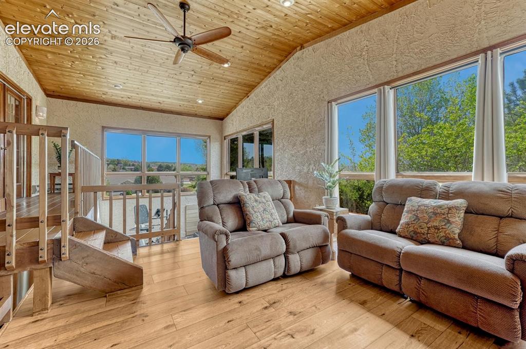 Image 20 of 50: Expansive, south-facing, multi-level sunroom includes a 50-amp hot tub outl