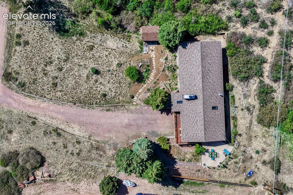 Image 4 of 50: Half acre lot fully xeriscaped!