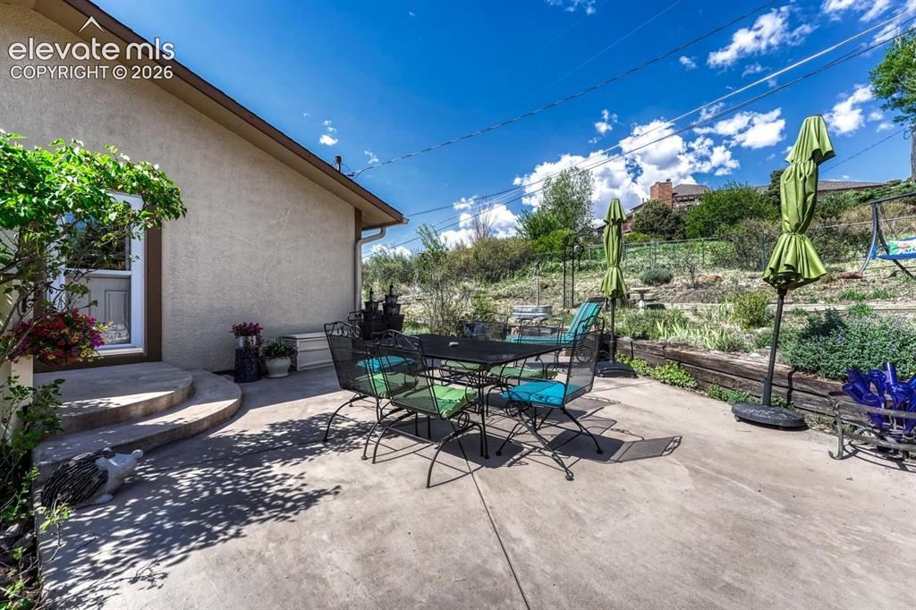 Image 43 of 50: Large, tranquil patio