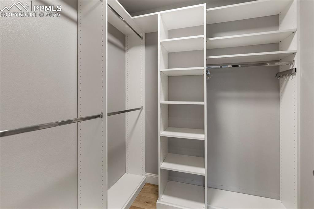 Image 22 of 44: walk-in closet with storage system
