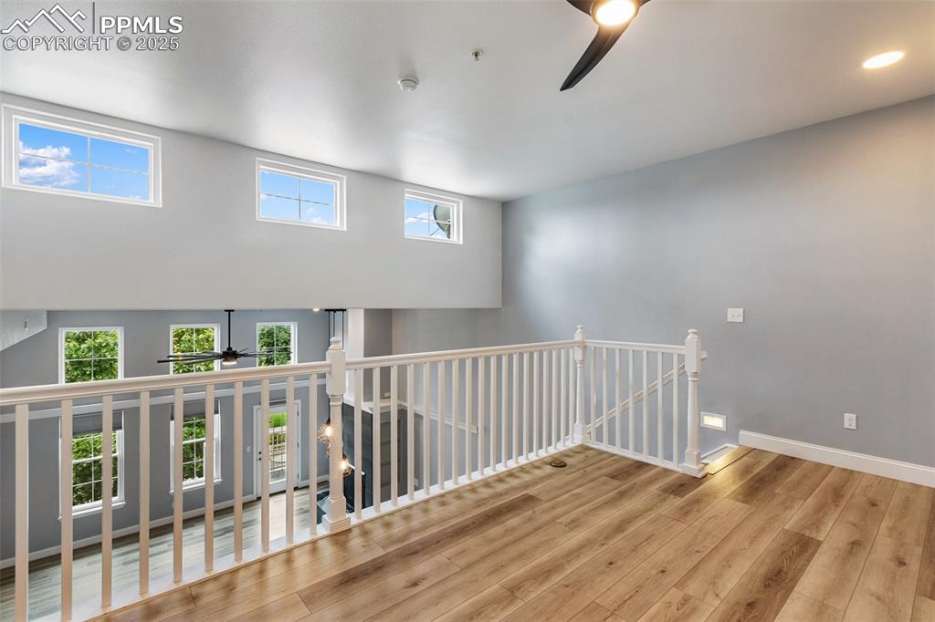 Image 28 of 44: Upper unit - Loft flex space perfect for an office or TV area on upper leve