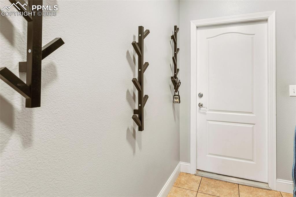 Image 38 of 44: Mudroom entry from garage on main level