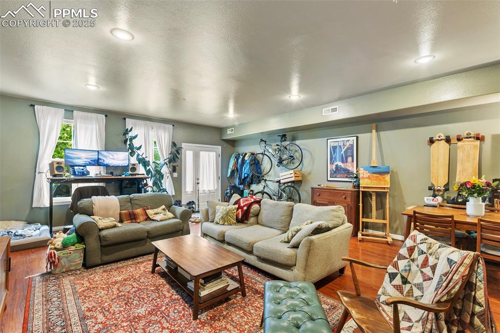 Image 39 of 44: Main level apartment with entry and windows
