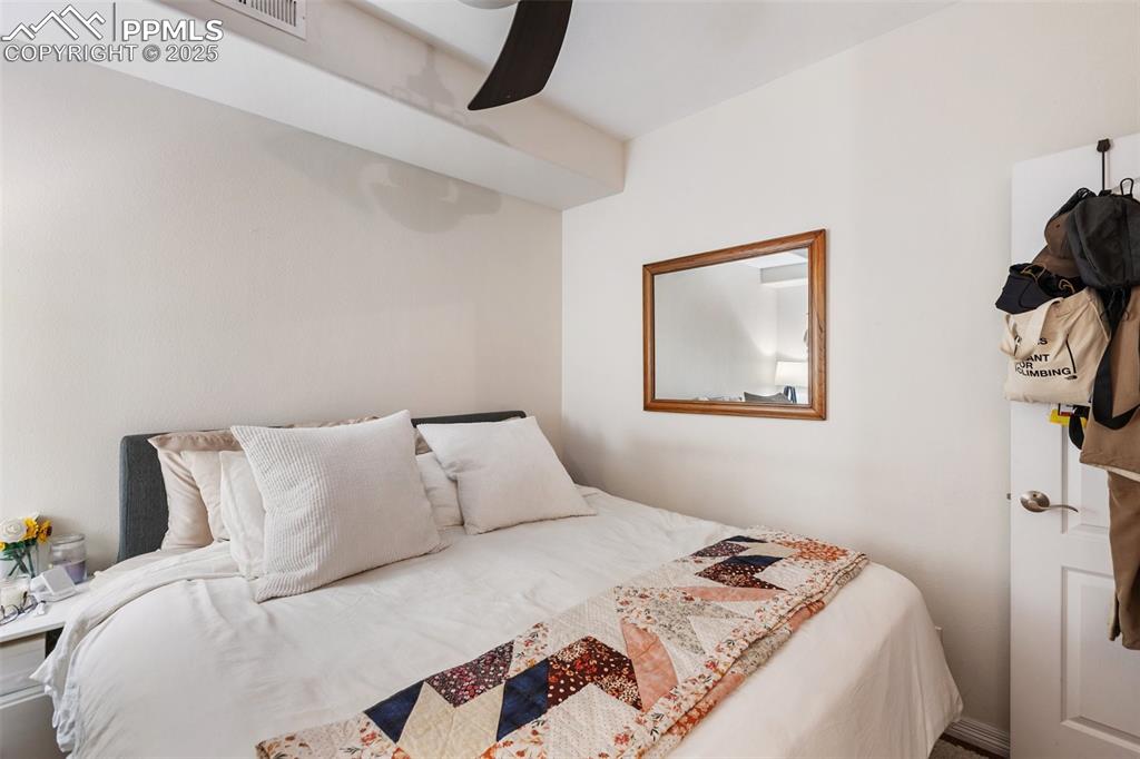 Image 41 of 44: Main level apartment bedroom