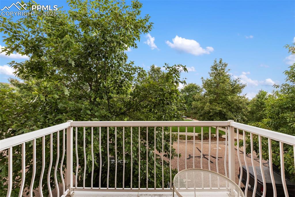 Image 44 of 44: Balcony walk-out from upper unit living room