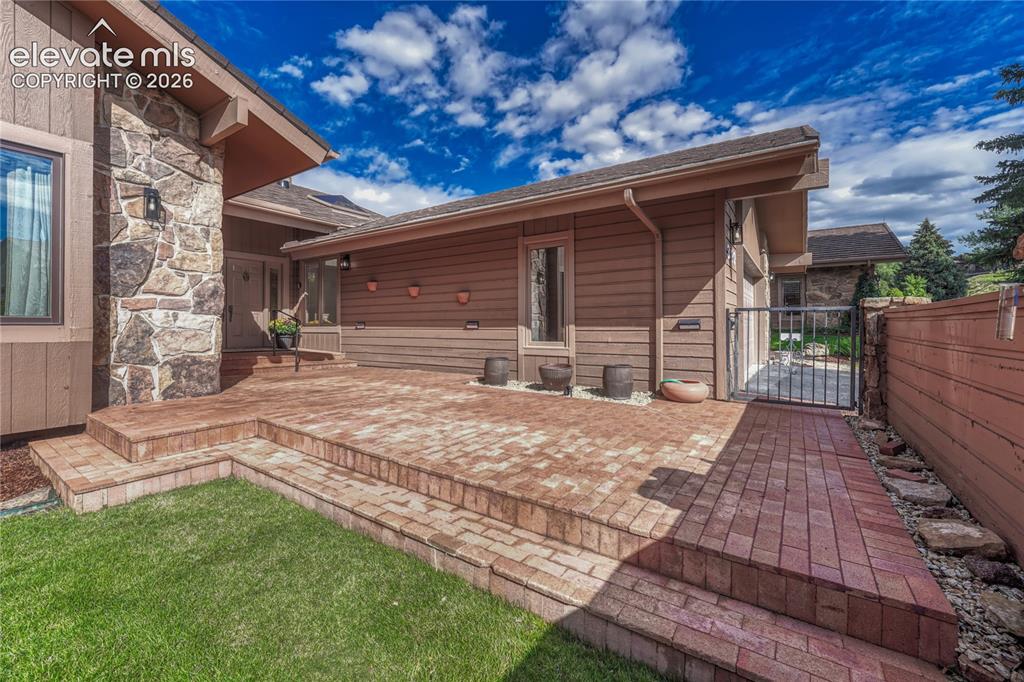 Image 11 of 49: Large Paver Courtyard & Front Porch