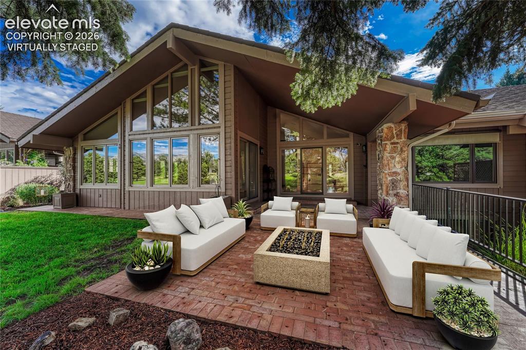 Image 2 of 49: "Virtually Staged", Large Partially Covered Paver Patio with Views.