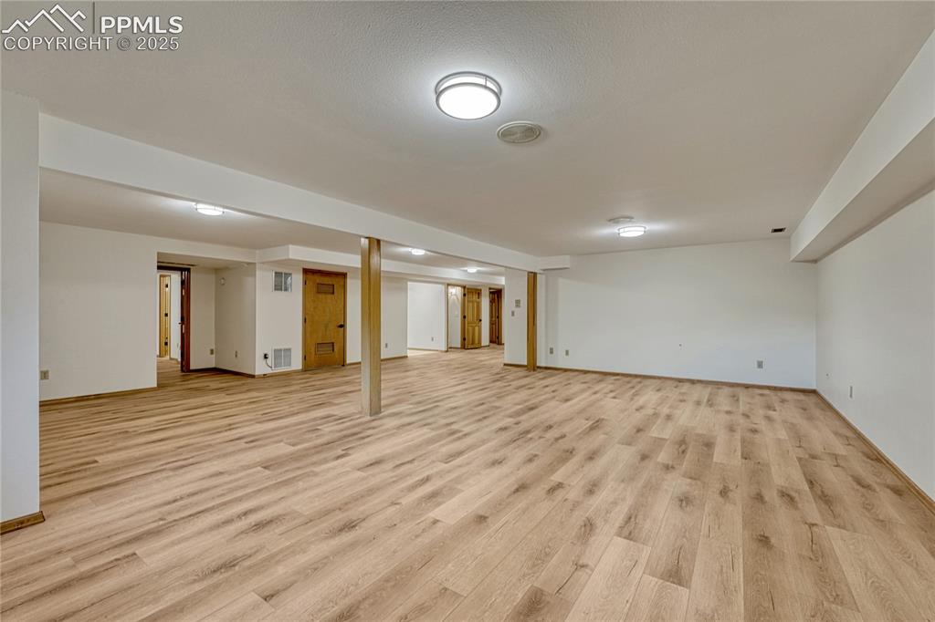 Image 26 of 49: All New LVT Floors, New LED Light Fixtures, New Paint