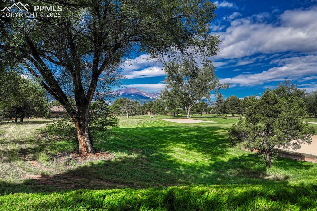 Image 3 of 49: Views of the Golf Course & Pikes Peak..."America