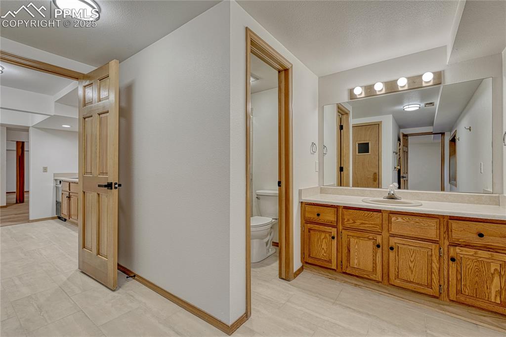 Image 31 of 49: Guest or Adjoining Bath with Sauna