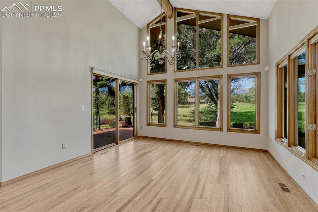 Image 42 of 49: Vaulted with Huge windows to the Golf Course & Views