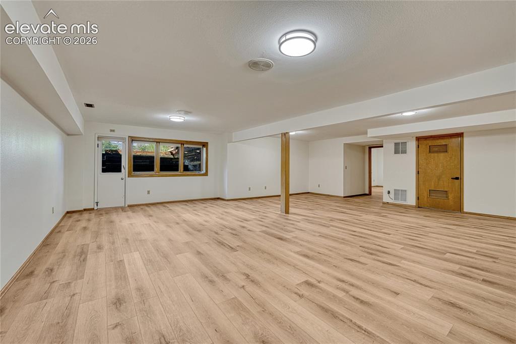 Image 44 of 49: Huge Rooms, New LVT Floors, Walkout Egress