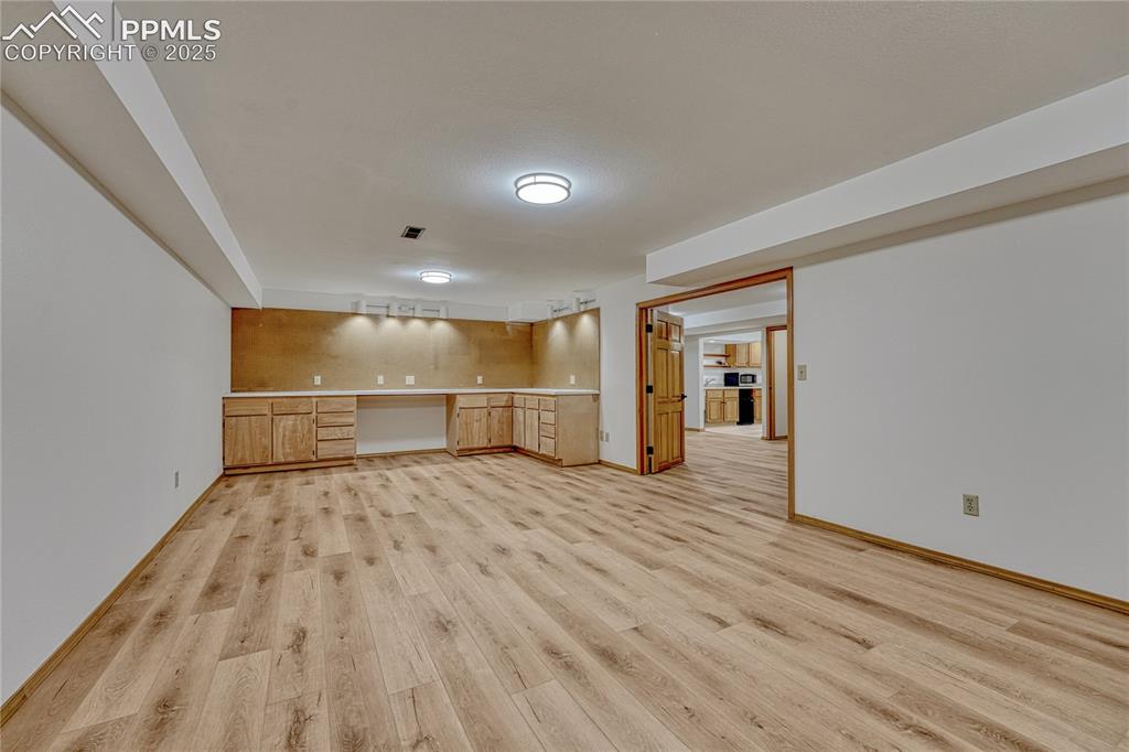 Image 46 of 49: All New LVT Floors, New LED Light Fixtures, New Paint