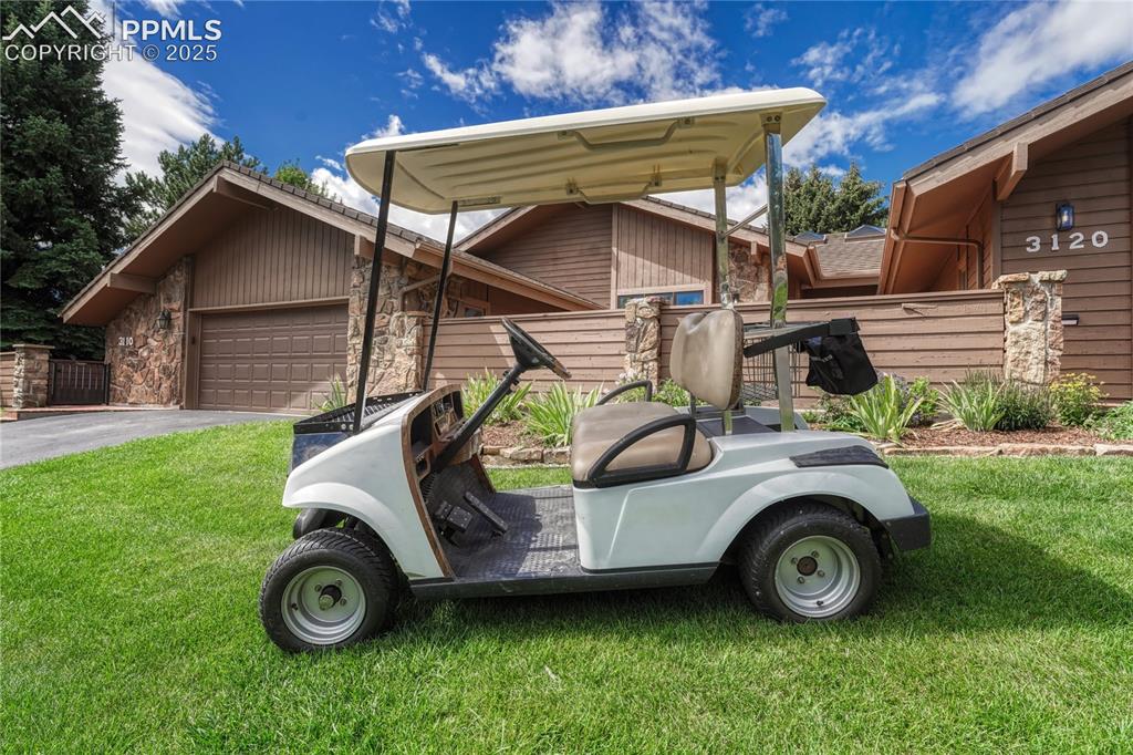 Image 49 of 49: Golf Cart is Included!