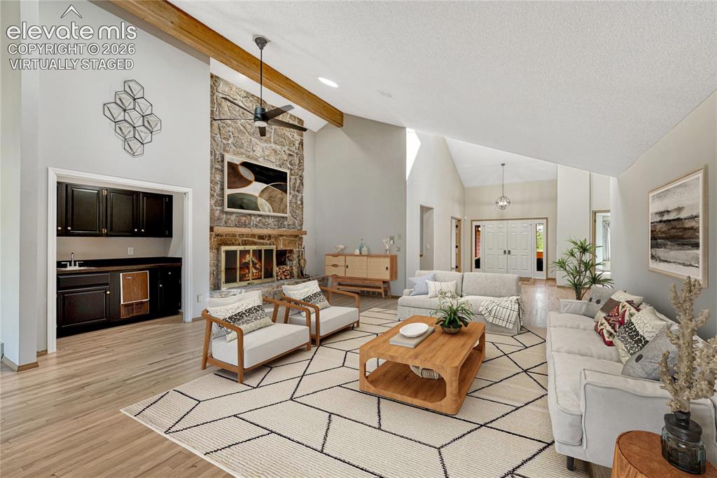 Image 5 of 49: "Virtually Staged" Vaulted with Wood Beam, Hardwood Floors, Wet Bar