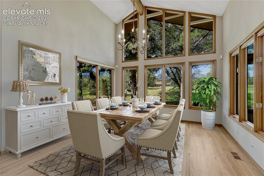 Image 6 of 49: "Virtually Staged" Vaulted with Huge Windows to the Golf Course & Views