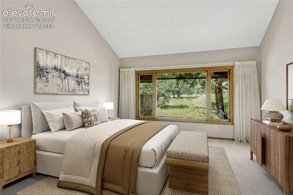 Image 7 of 49: "Virtually Staged" Vaulted Primary Suite with Large Windows to the West, En
