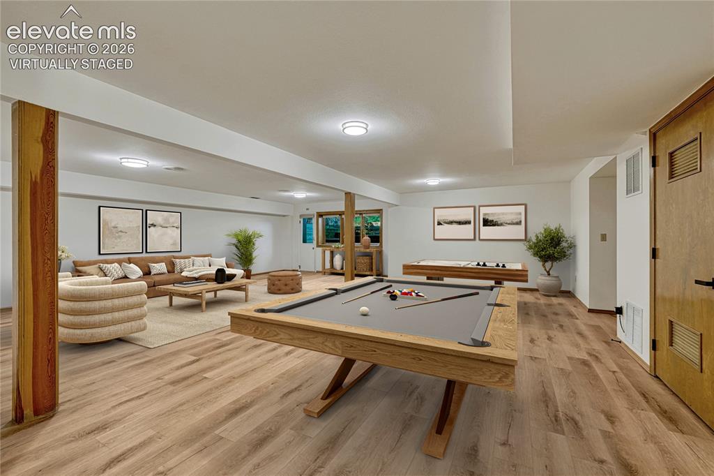 Image 9 of 49: "Virtually Staged" All New LVT Floors, New LED Light Fixtures, New Paint