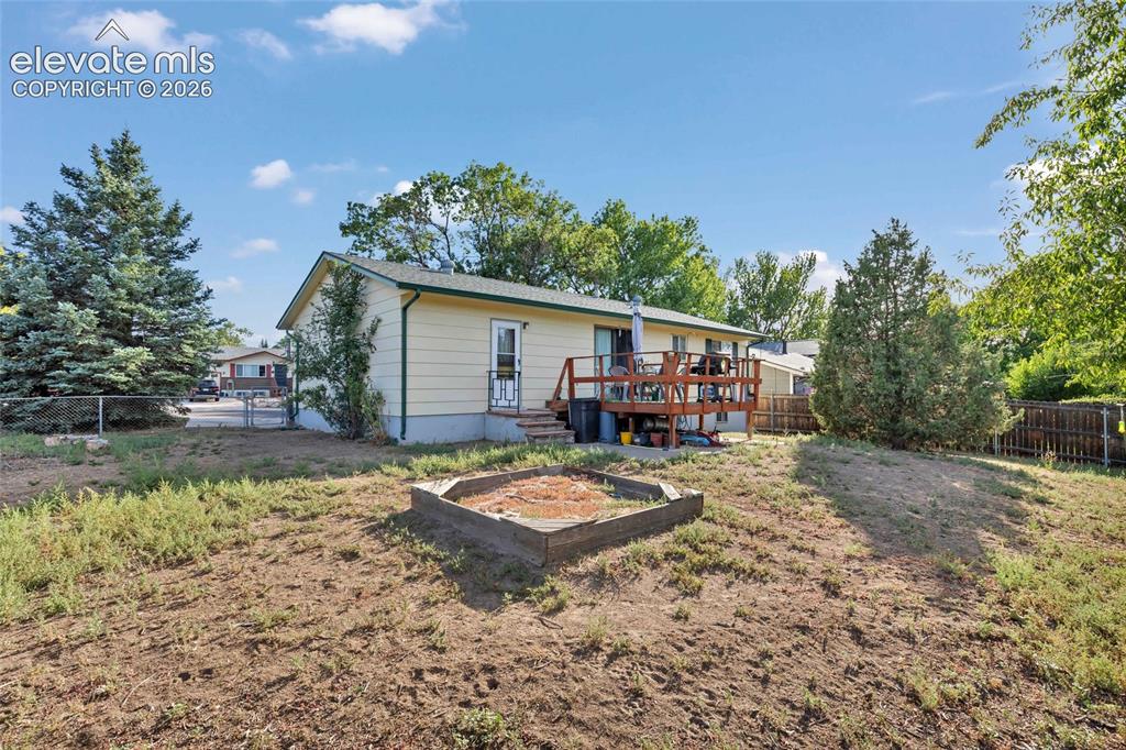 Image 24 of 26: Looking at rear exterior
