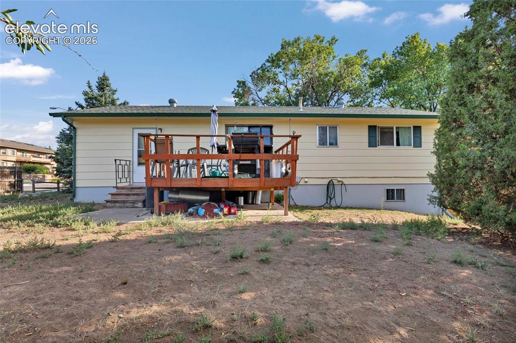 Image 25 of 26: Rear wood deck