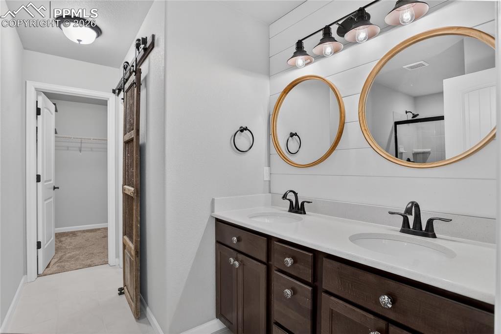Image 24 of 50: Primary ensuite bath.