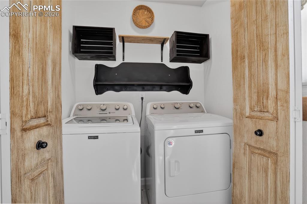 Image 30 of 50: Main level laundry.