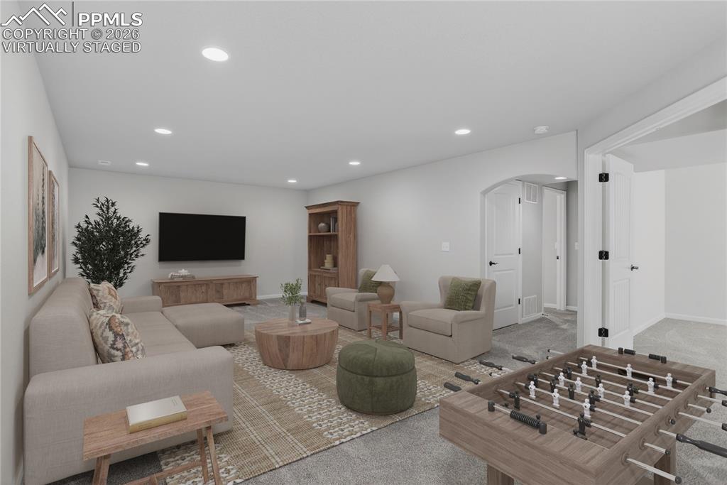Image 31 of 50: Family room - virtually staged.