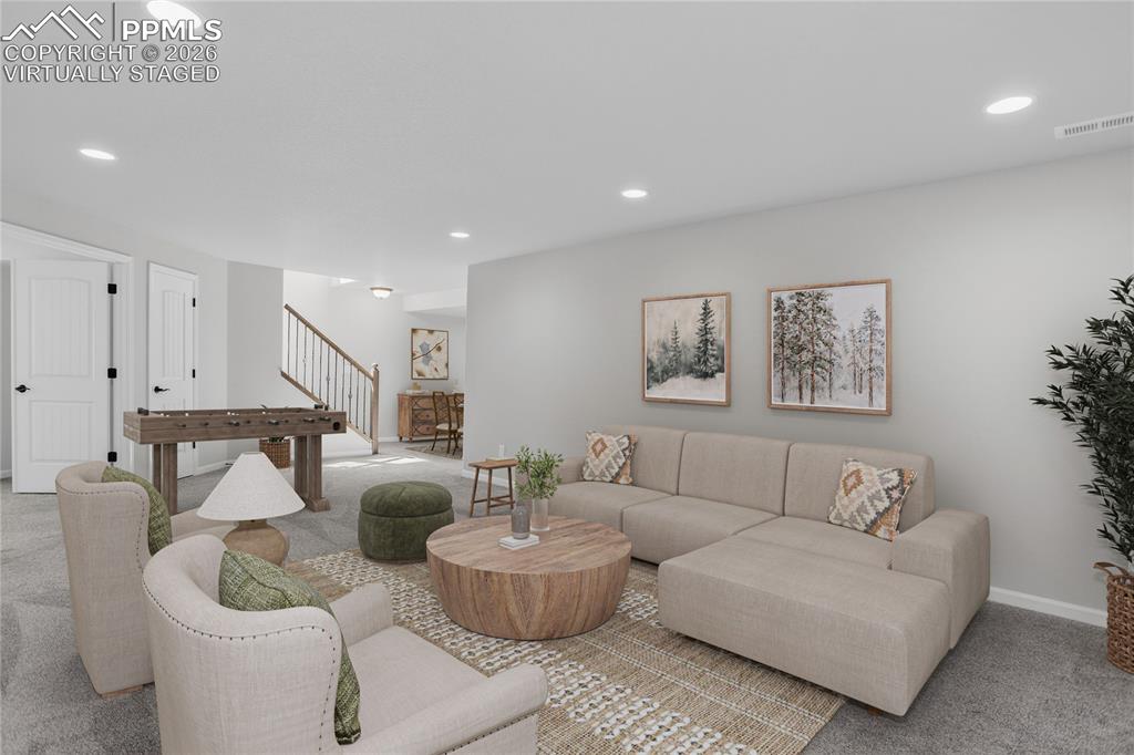 Image 33 of 50: Family room - virtually staged.