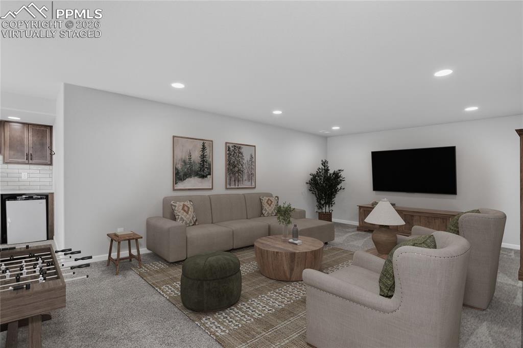Image 35 of 50: Family room - virtually staged.