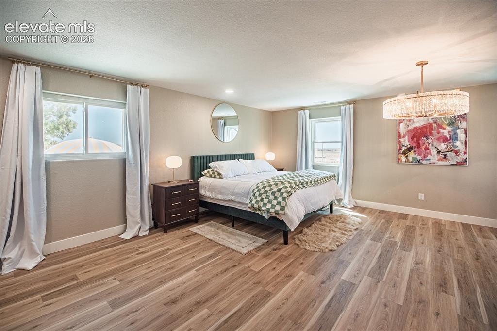 Image 30 of 50: Master Bedroom