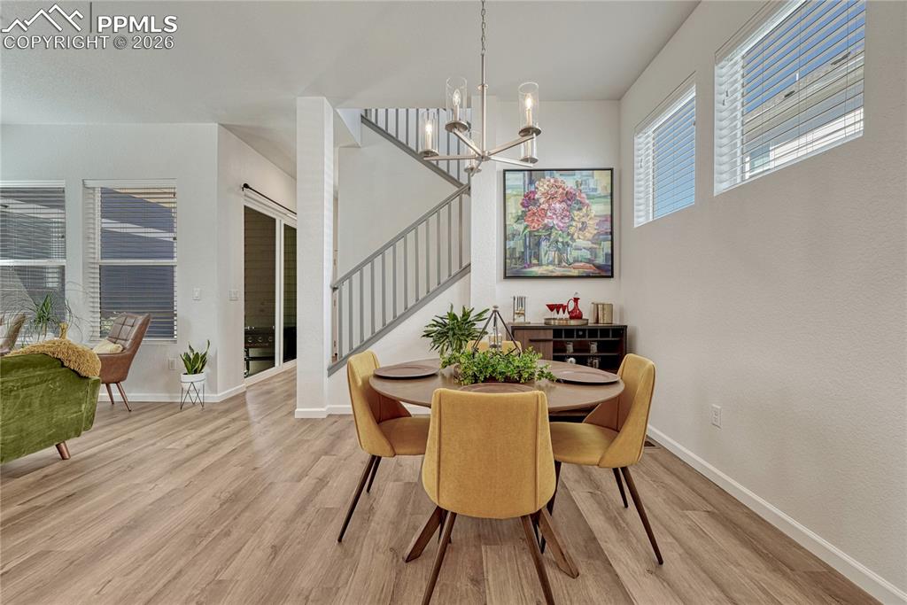 Image 17 of 50: Large windows higher on the wall offer privacy from neighbors but still let