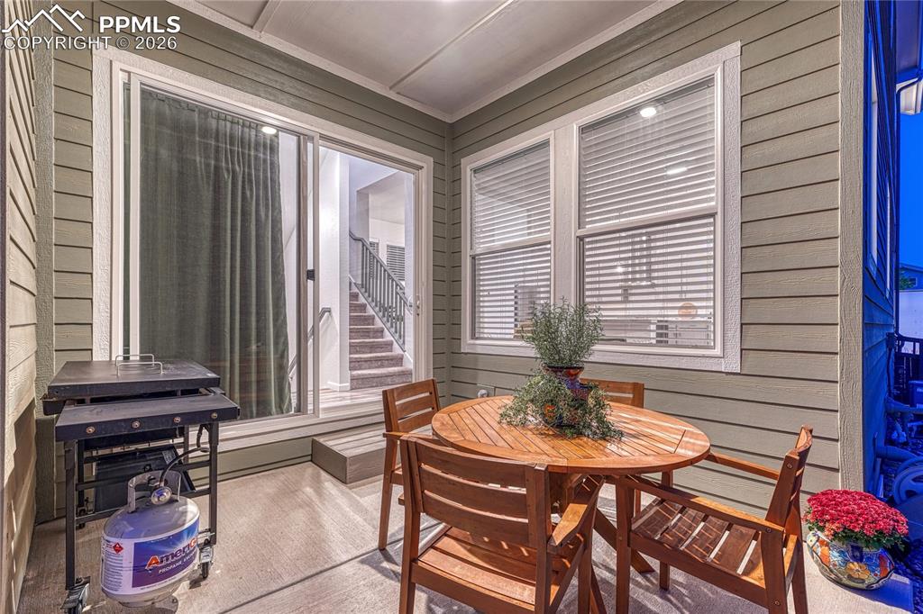 Image 41 of 50: Off the main living space is the covered patio to enjoy mornings and evenin