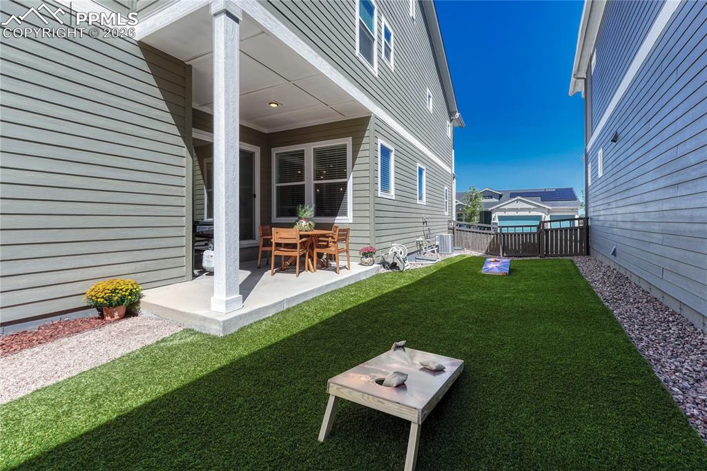 Image 44 of 50: The side yard is actually quite private due to the limited windows on the n