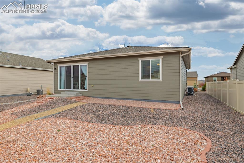 Image 34 of 37: Rear view of house