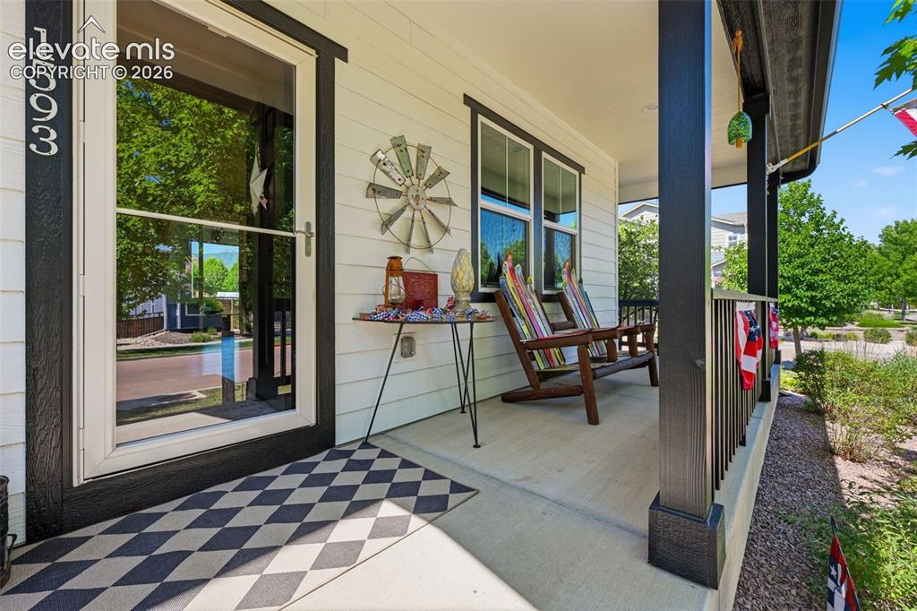 Image 11 of 46: Covered Front Porch