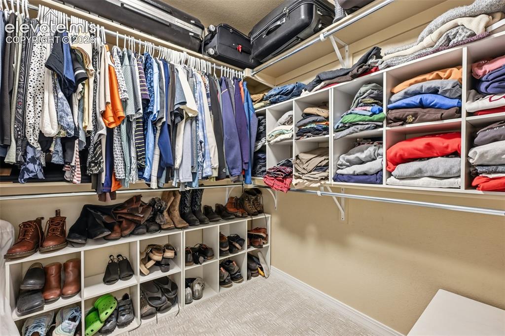 Image 33 of 46: Huge Primary Bedroom Walk In Closet