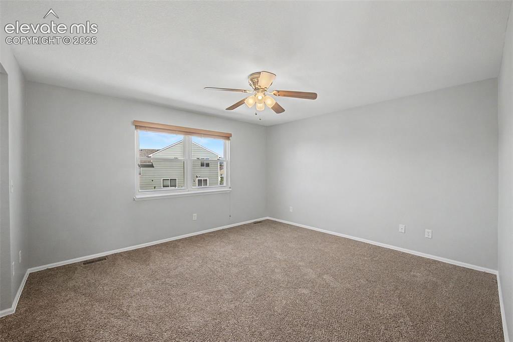 Image 11 of 17: Primary suite with attached bathroom 