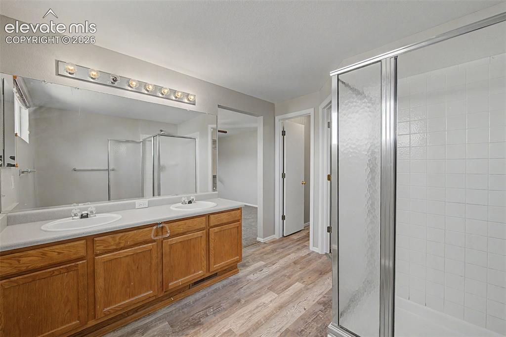 Image 12 of 17: 4-piece primary suite bathroom, large walk-in closet