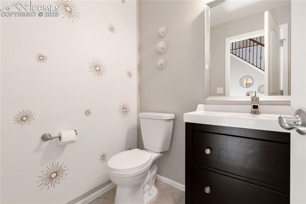 Image 18 of 43: 1/2 bath on the main level!