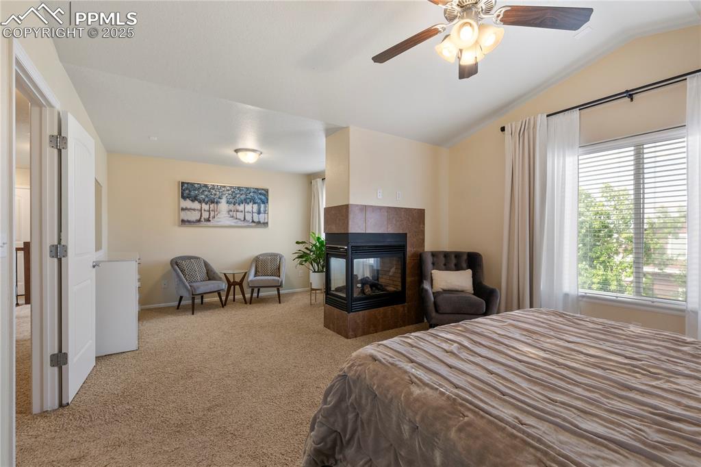 Image 20 of 43: Gas fireplace in primary bedroom!