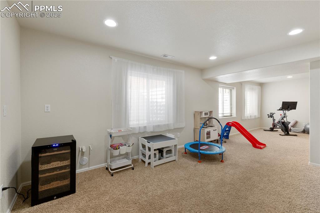 Image 29 of 43: Another view of family room in basement!