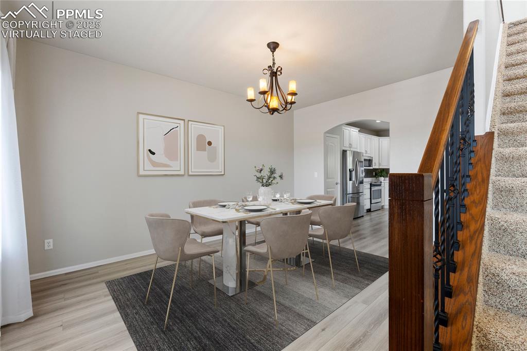 Image 5 of 43: Virtually staged picture of formal dining or could be a second living room!
