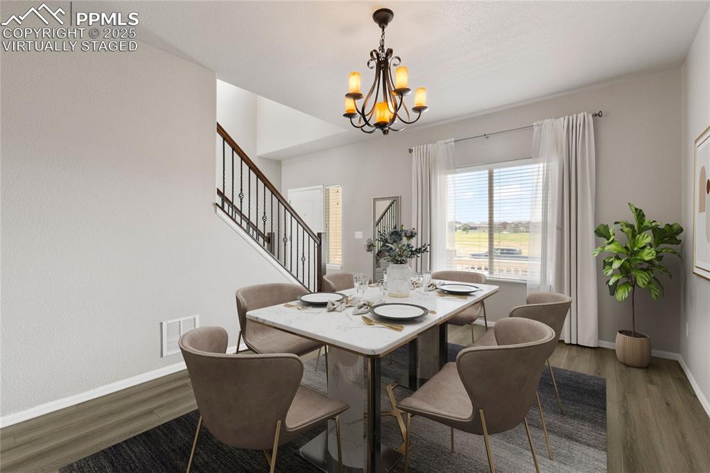 Image 9 of 43: Virtually stagedpicture of different view of formal dining room/2nd living