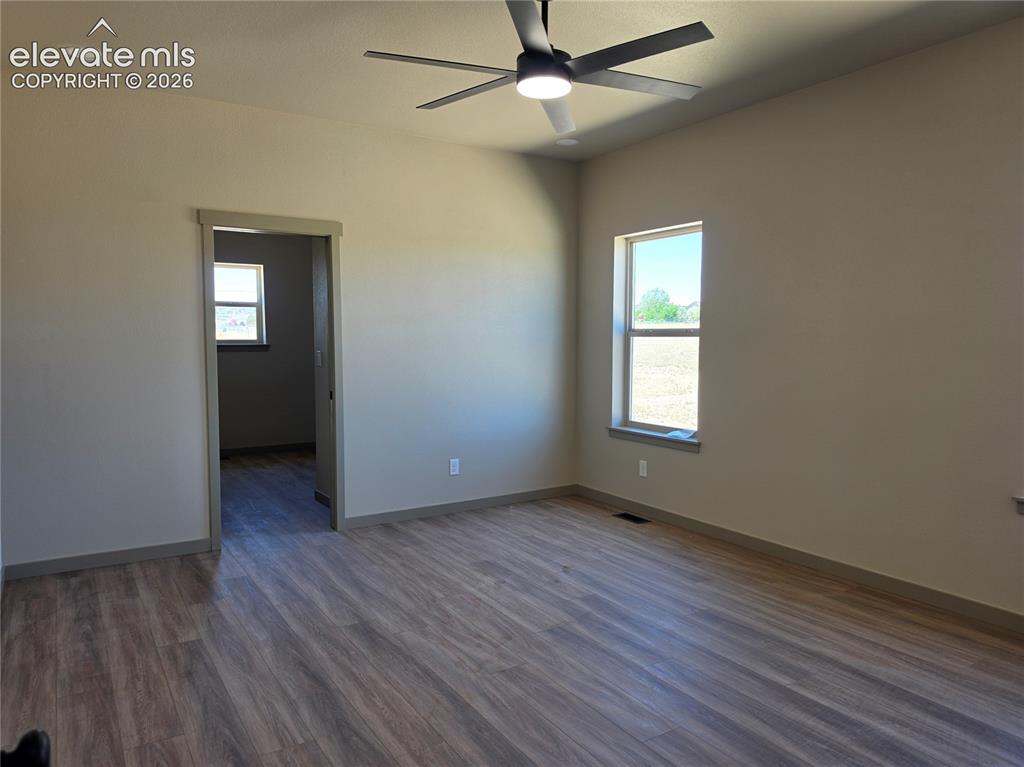 Image 19 of 31: Master bedroom