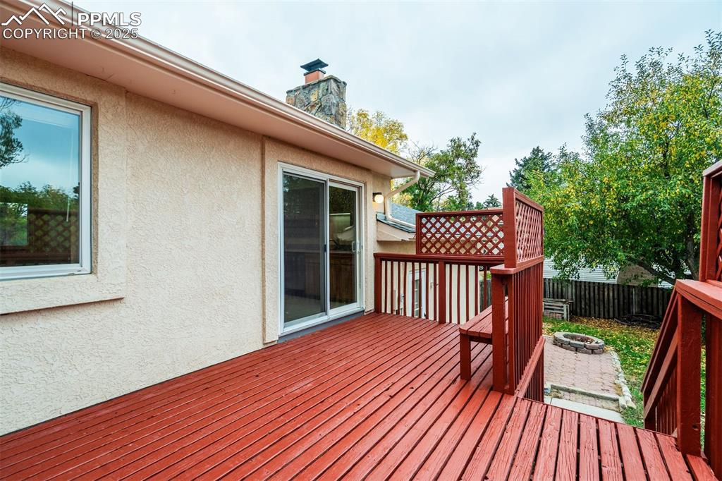 Image 14 of 44: Fire pit on brick patio